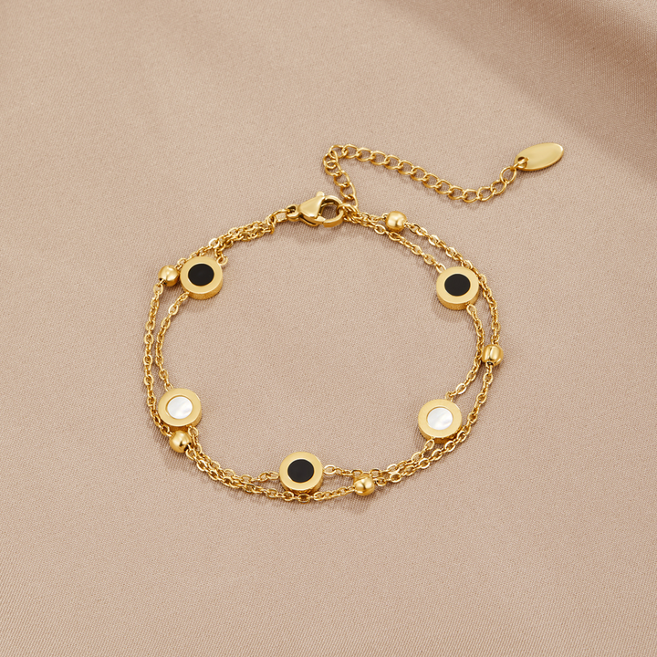 Pulsera de ónix y piedra blanca