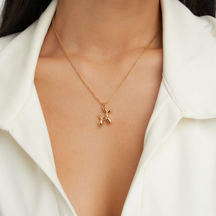 Collar de Bola Dorada con Forma de Animal
